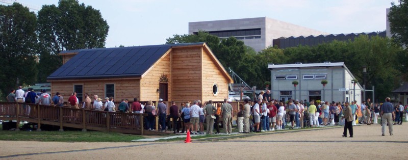 line of people waiting to enter a Solar Decathlon house on the National Mall in Washington, DC